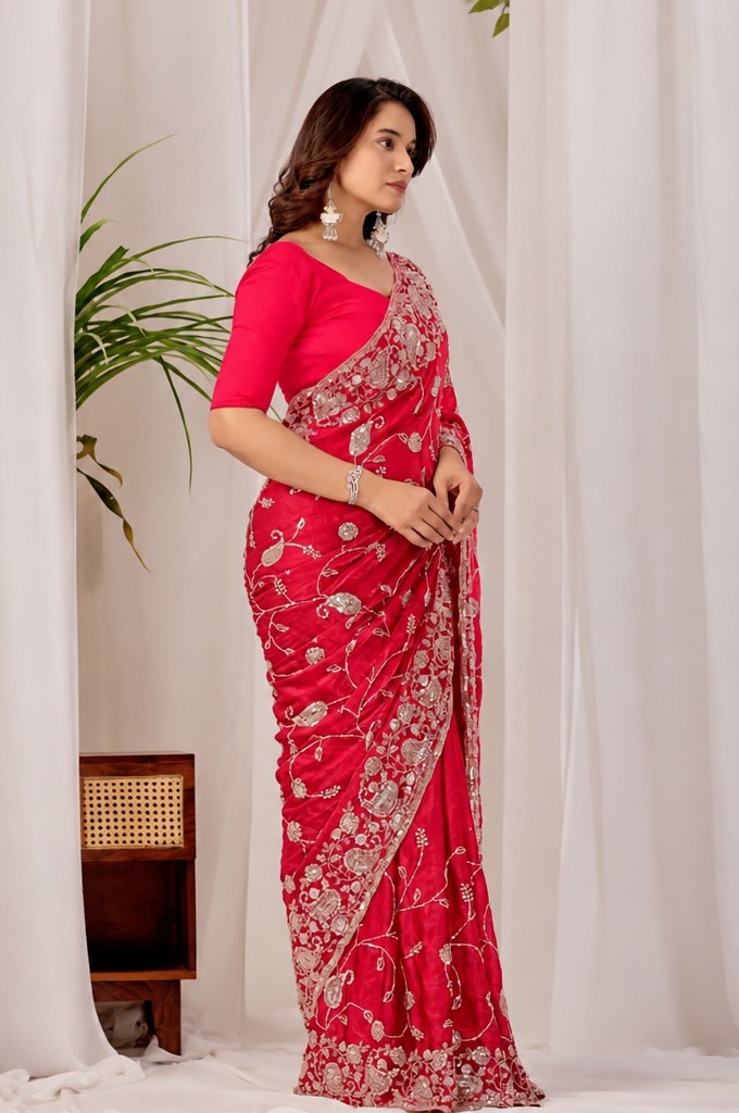 Red Regal Floral Heritage Saree Red Regal Floral Heritage Saree + The Red Regal Floral Heritage Saree brings traditional floral motif weaving to a red base, and it's built for anyone comparing options for a red saree rather than something purely decorative. The colour reads true in both daylight and indoor event lighting, which matters more than it sounds &mdash; a lot of sarees photograph differently under venue lighting than they do in a product shot, and this one has been chosen to hold its tone consistently. &bull; Craftsmanship