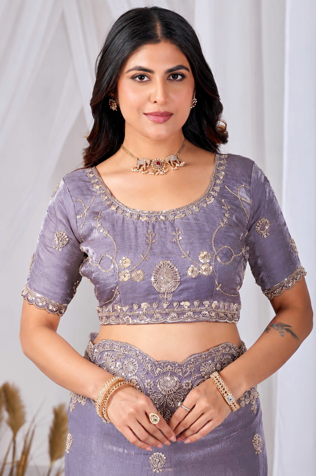 Purple Tikki Moti Work Embroidered Designer Saree Purple Tikki Moti Work Embroidered Designer Saree + The Purple Tikki Moti Work Embroidered Designer Saree brings tikki (metallic sequin) and moti (pearl-bead) hand embroidery to a purple base, and it's built for anyone comparing options for a purple saree rather than something purely decorative. The colour reads true in both daylight and indoor event lighting, which matters more than it sounds &mdash; a lot of sarees photograph differently under venue lighting than they do in a product shot, and this one has been chosen to hold its tone consistently. &bull; Craftsmanship