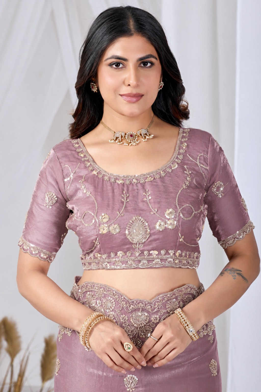 Pink Tikki Moti Work Embroidered Designer Saree Pink Tikki Moti Work Embroidered Designer Saree + The Pink Tikki Moti Work Embroidered Designer Saree brings tikki (metallic sequin) and moti (pearl-bead) hand embroidery to a pink base, and it's built for anyone comparing options for a pink saree rather than something purely decorative. The colour reads true in both daylight and indoor event lighting, which matters more than it sounds &mdash; a lot of sarees photograph differently under venue lighting than they do in a product shot, and this one has been chosen to hold its tone consistently. &bull; Craftsmanship
