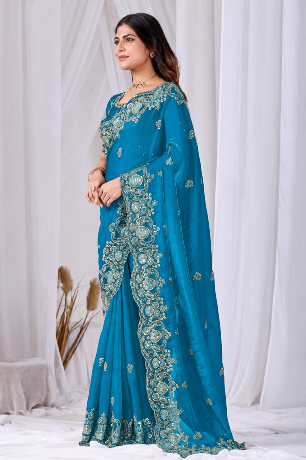 Sky Blue Tikki Moti Work Embroidered Designer Saree Sky Blue Tikki Moti Work Embroidered Designer Saree + The Sky Blue Tikki Moti Work Embroidered Designer Saree brings tikki (metallic sequin) and moti (pearl-bead) hand embroidery to a sky blue base, and it's built for anyone comparing options for a sky sarees rather than something purely decorative. The colour reads true in both daylight and indoor event lighting, which matters more than it sounds &mdash; a lot of sarees photograph differently under venue lighting than they do in a product shot, and this one has been chosen to hold its tone consistently. &bull; Craftsmanship