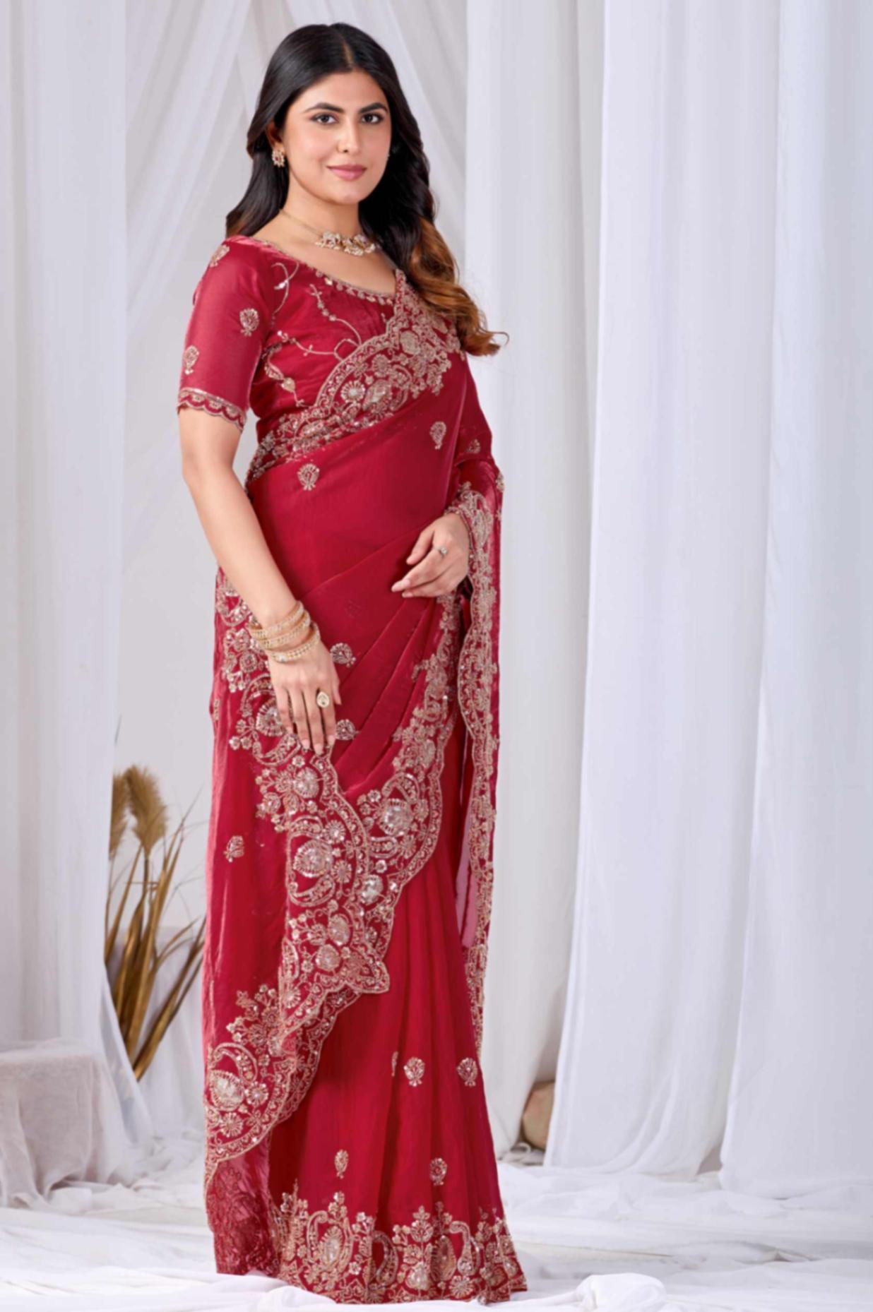 Rose Red Tikki Moti Work Embroidered Designer Saree Rose Red Tikki Moti Work Embroidered Designer Saree + The Rose Red Tikki Moti Work Embroidered Designer Saree brings tikki (metallic sequin) and moti (pearl-bead) hand embroidery to a rose red base, and it's built for anyone comparing options for a saree rose rather than something purely decorative. The colour reads true in both daylight and indoor event lighting, which matters more than it sounds &mdash; a lot of sarees photograph differently under venue lighting than they do in a product shot, and this one has been chosen to hold its tone consistently. &bull; Craftsmanship