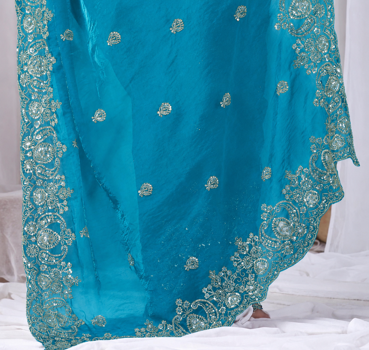 Sky Blue Tikki Moti Work Embroidered Designer Saree Sky Blue Tikki Moti Work Embroidered Designer Saree + The Sky Blue Tikki Moti Work Embroidered Designer Saree brings tikki (metallic sequin) and moti (pearl-bead) hand embroidery to a sky blue base, and it's built for anyone comparing options for a sky sarees rather than something purely decorative. The colour reads true in both daylight and indoor event lighting, which matters more than it sounds &mdash; a lot of sarees photograph differently under venue lighting than they do in a product shot, and this one has been chosen to hold its tone consistently. &bull; Craftsmanship