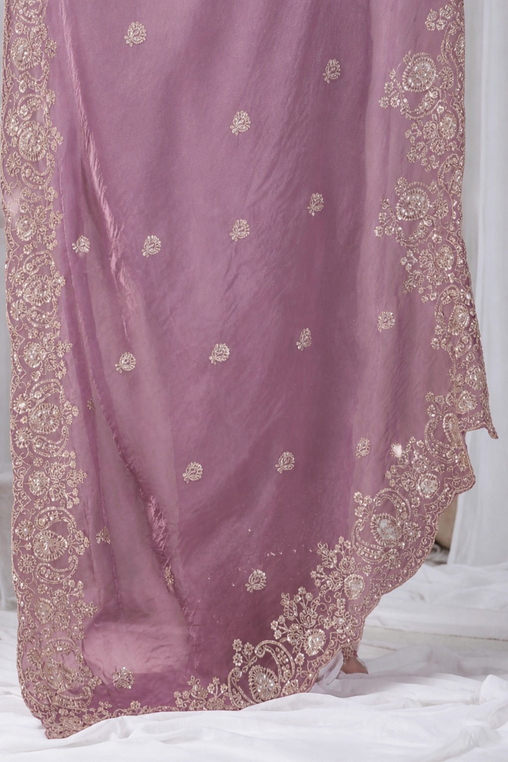 Pink Tikki Moti Work Embroidered Designer Saree Pink Tikki Moti Work Embroidered Designer Saree + The Pink Tikki Moti Work Embroidered Designer Saree brings tikki (metallic sequin) and moti (pearl-bead) hand embroidery to a pink base, and it's built for anyone comparing options for a pink saree rather than something purely decorative. The colour reads true in both daylight and indoor event lighting, which matters more than it sounds &mdash; a lot of sarees photograph differently under venue lighting than they do in a product shot, and this one has been chosen to hold its tone consistently. &bull; Craftsmanship