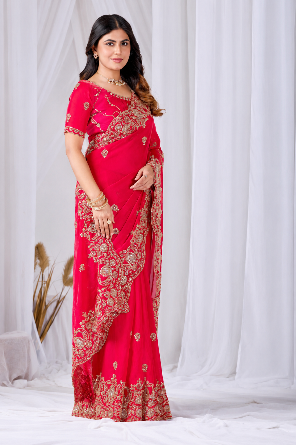 Red Tikki Moti Work Embroidered Designer Saree Red Tikki Moti Work Embroidered Designer Saree + The Red Tikki Moti Work Embroidered Designer Saree brings tikki (metallic sequin) and moti (pearl-bead) hand embroidery to a red base, and it's built for anyone comparing options for a red saree rather than something purely decorative. The colour reads true in both daylight and indoor event lighting, which matters more than it sounds &mdash; a lot of sarees photograph differently under venue lighting than they do in a product shot, and this one has been chosen to hold its tone consistently. &bull; Craftsmanship