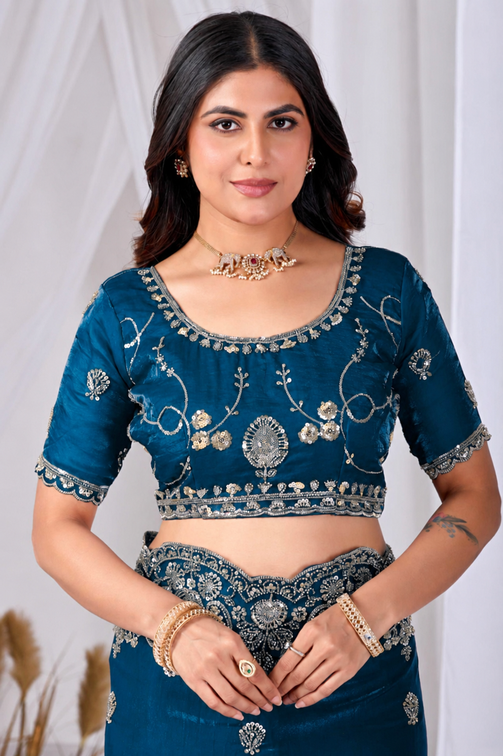 Blue Tikki Moti Work Embroidered Designer Saree Blue Tikki Moti Work Embroidered Designer Saree + The Blue Tikki Moti Work Embroidered Designer Saree brings tikki (metallic sequin) and moti (pearl-bead) hand embroidery to a blue base, and it's built for anyone comparing options for a blue saree rather than something purely decorative. The colour reads true in both daylight and indoor event lighting, which matters more than it sounds &mdash; a lot of sarees photograph differently under venue lighting than they do in a product shot, and this one has been chosen to hold its tone consistently. &bull; Craftsmanship