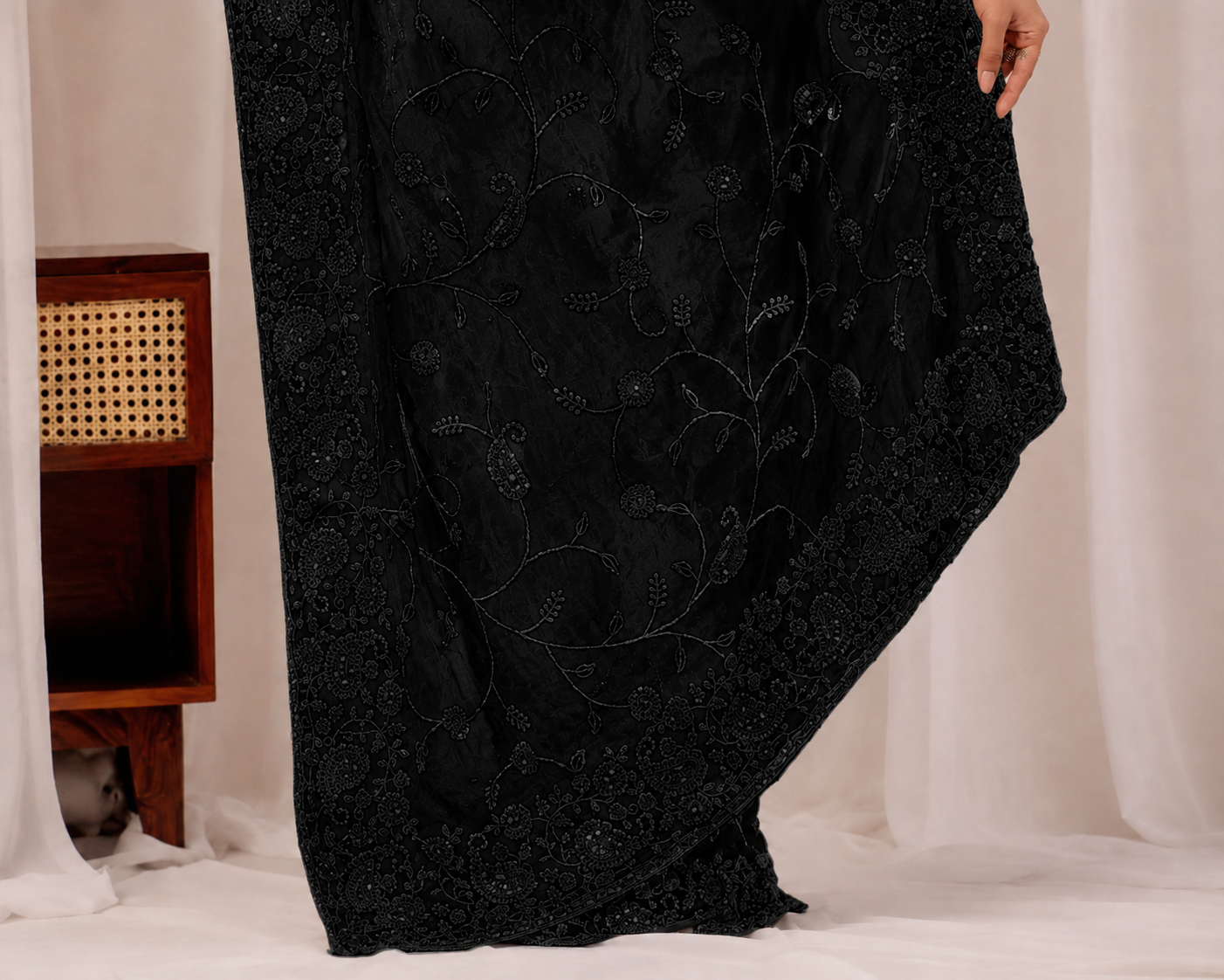 Black Regal Floral Heritage Saree Black Regal Floral Heritage Saree + The Black Regal Floral Heritage Saree brings traditional floral motif weaving to a black base, and it's built for anyone comparing options for a black saree rather than something purely decorative. The colour reads true in both daylight and indoor event lighting, which matters more than it sounds &mdash; a lot of sarees photograph differently under venue lighting than they do in a product shot, and this one has been chosen to hold its tone consistently. &bull; Craftsmanship