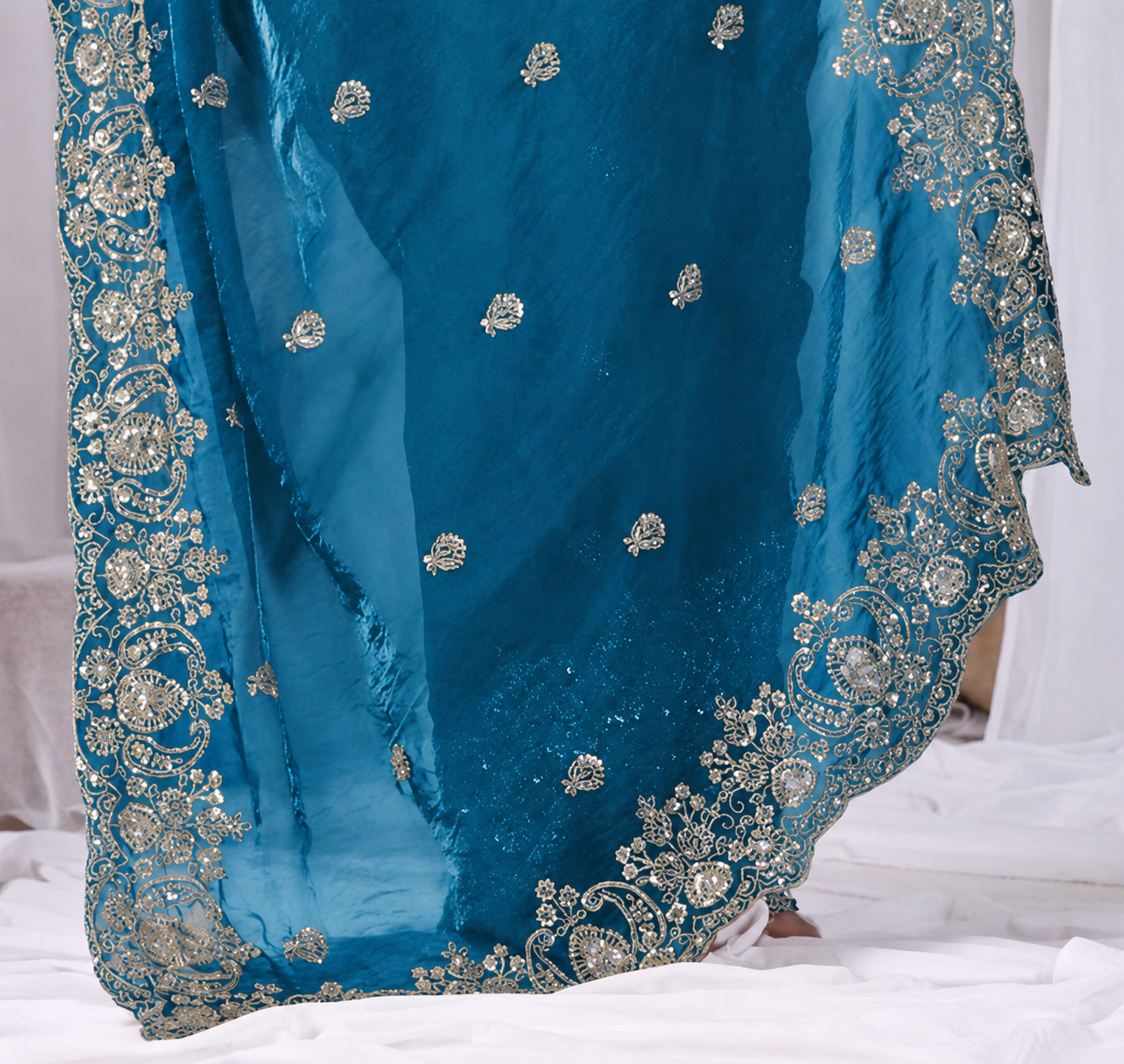 Blue Tikki Moti Work Embroidered Designer Saree Blue Tikki Moti Work Embroidered Designer Saree + The Blue Tikki Moti Work Embroidered Designer Saree brings tikki (metallic sequin) and moti (pearl-bead) hand embroidery to a blue base, and it's built for anyone comparing options for a blue saree rather than something purely decorative. The colour reads true in both daylight and indoor event lighting, which matters more than it sounds &mdash; a lot of sarees photograph differently under venue lighting than they do in a product shot, and this one has been chosen to hold its tone consistently. &bull; Craftsmanship