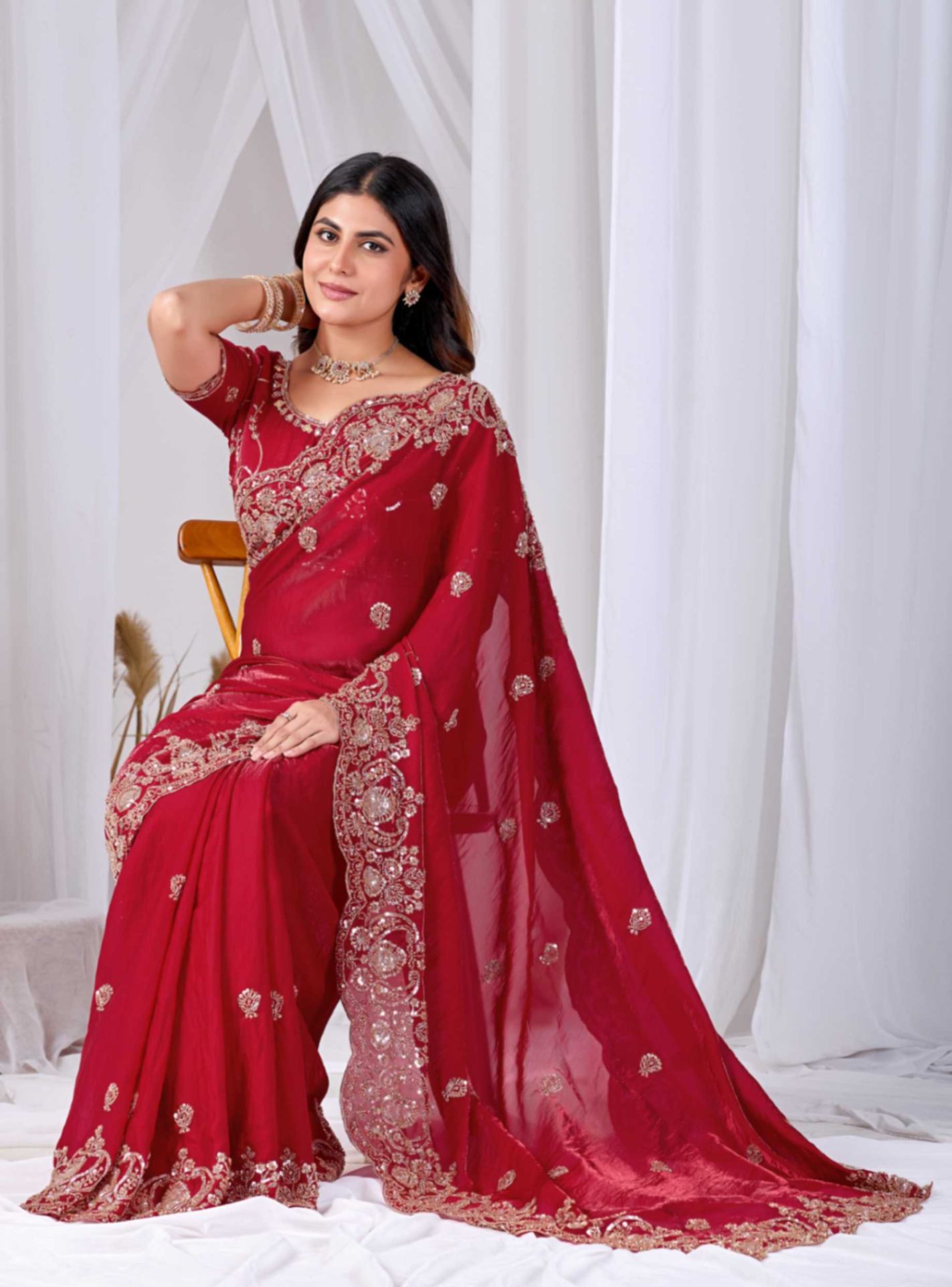 Rose Red Tikki Moti Work Embroidered Designer Saree Rose Red Tikki Moti Work Embroidered Designer Saree + The Rose Red Tikki Moti Work Embroidered Designer Saree brings tikki (metallic sequin) and moti (pearl-bead) hand embroidery to a rose red base, and it's built for anyone comparing options for a saree rose rather than something purely decorative. The colour reads true in both daylight and indoor event lighting, which matters more than it sounds &mdash; a lot of sarees photograph differently under venue lighting than they do in a product shot, and this one has been chosen to hold its tone consistently. &bull; Craftsmanship