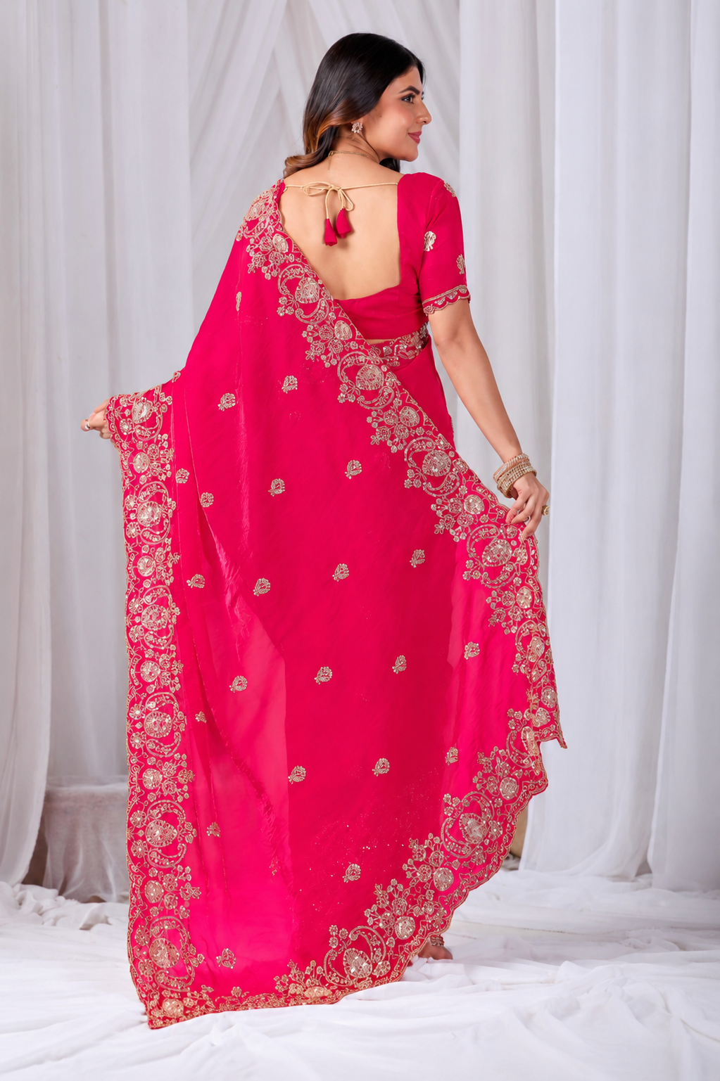 Dark Pink Tikki Moti Work Embroidered Designer Saree Dark Pink Tikki Moti Work Embroidered Designer Saree + The Dark Pink Tikki Moti Work Embroidered Designer Saree brings tikki (metallic sequin) and moti (pearl-bead) hand embroidery to a dark pink base, and it's built for anyone comparing options for a dark pink saree rather than something purely decorative. The colour reads true in both daylight and indoor event lighting, which matters more than it sounds &mdash; a lot of sarees photograph differently under venue lighting than they do in a product shot, and this one has been chosen to hold its tone consistently. &bull; Craftsmanship