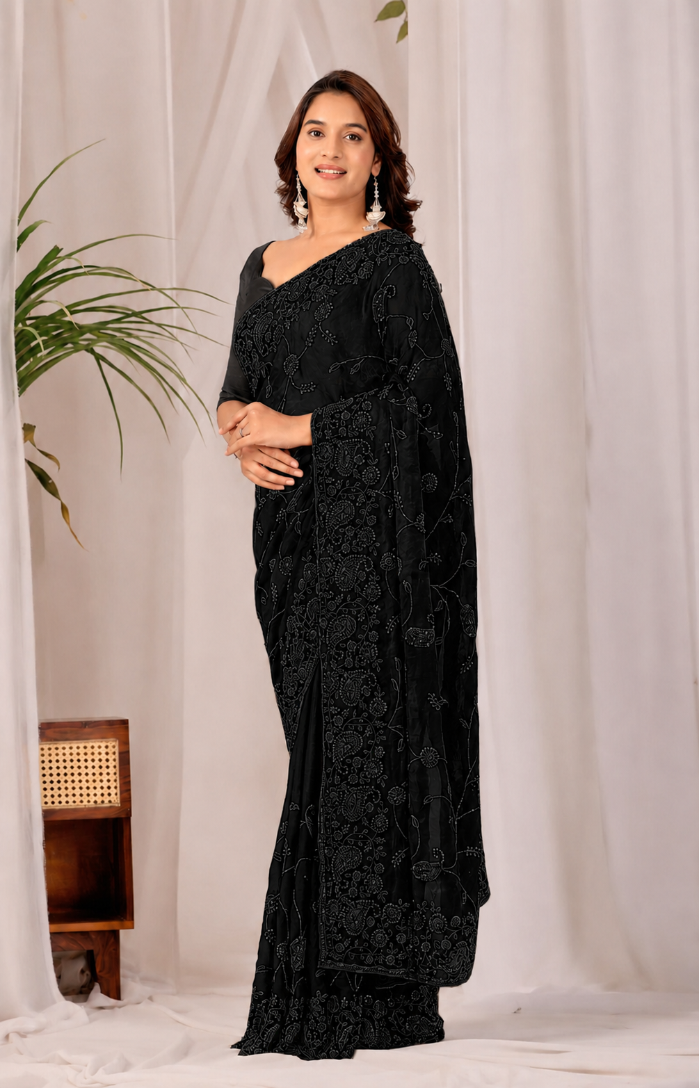 Black Regal Floral Heritage Saree Black Regal Floral Heritage Saree + The Black Regal Floral Heritage Saree brings traditional floral motif weaving to a black base, and it's built for anyone comparing options for a black saree rather than something purely decorative. The colour reads true in both daylight and indoor event lighting, which matters more than it sounds &mdash; a lot of sarees photograph differently under venue lighting than they do in a product shot, and this one has been chosen to hold its tone consistently. &bull; Craftsmanship