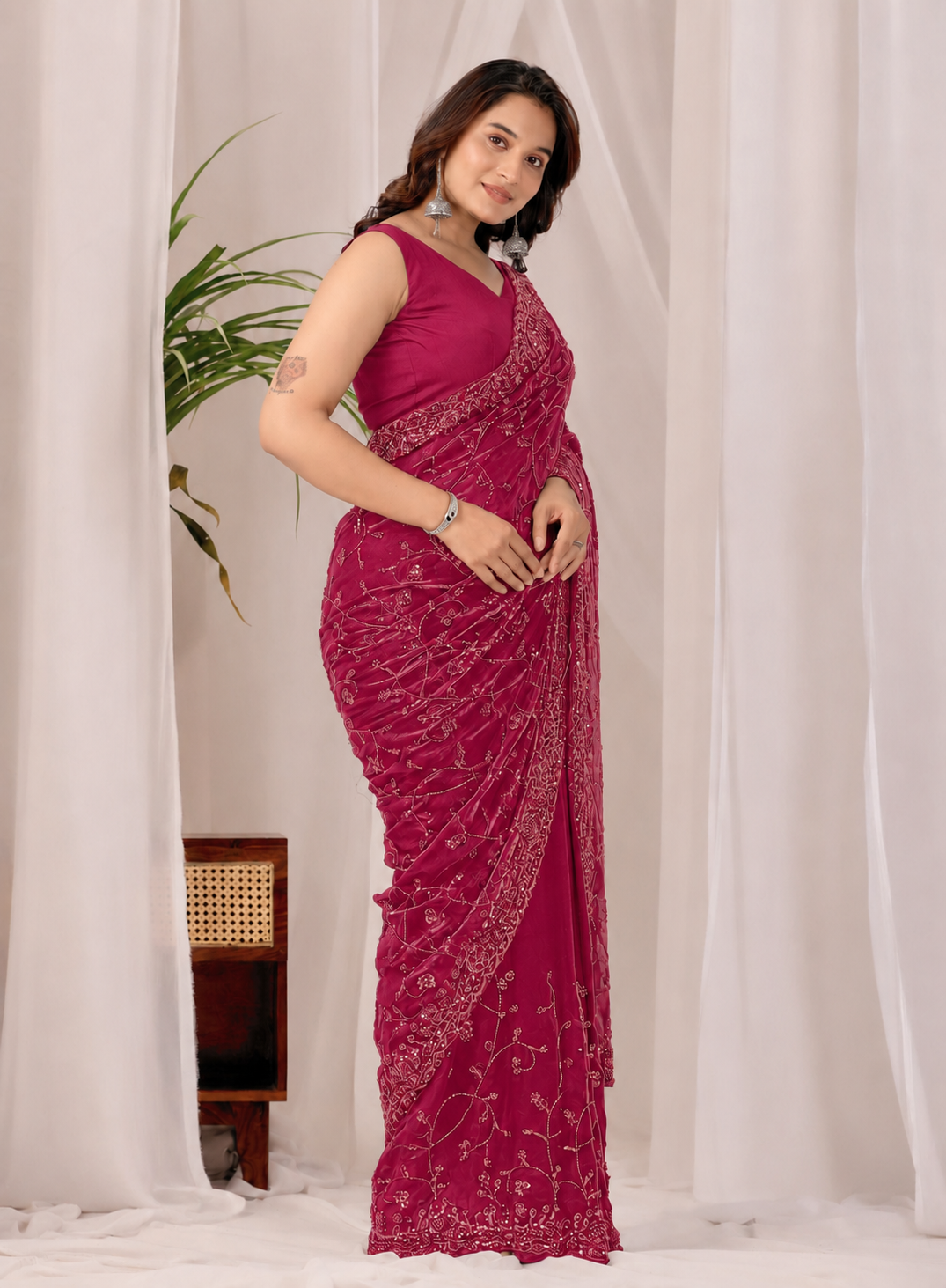 The Rose Red Onyx Sequin Heritage Saree The Dark Pink Onyx Sequin Heritage Saree + The Dark Pink Onyx Sequin Heritage Saree brings dense sequin embroidery to a dark pink base, and it's built for anyone comparing options for a dark pink saree rather than something purely decorative. The colour reads true in both daylight and indoor event lighting, which matters more than it sounds &mdash; a lot of sarees photograph differently under venue lighting than they do in a product shot, and this one has been chosen to hold its tone consistently. &bull; Craftsmanship