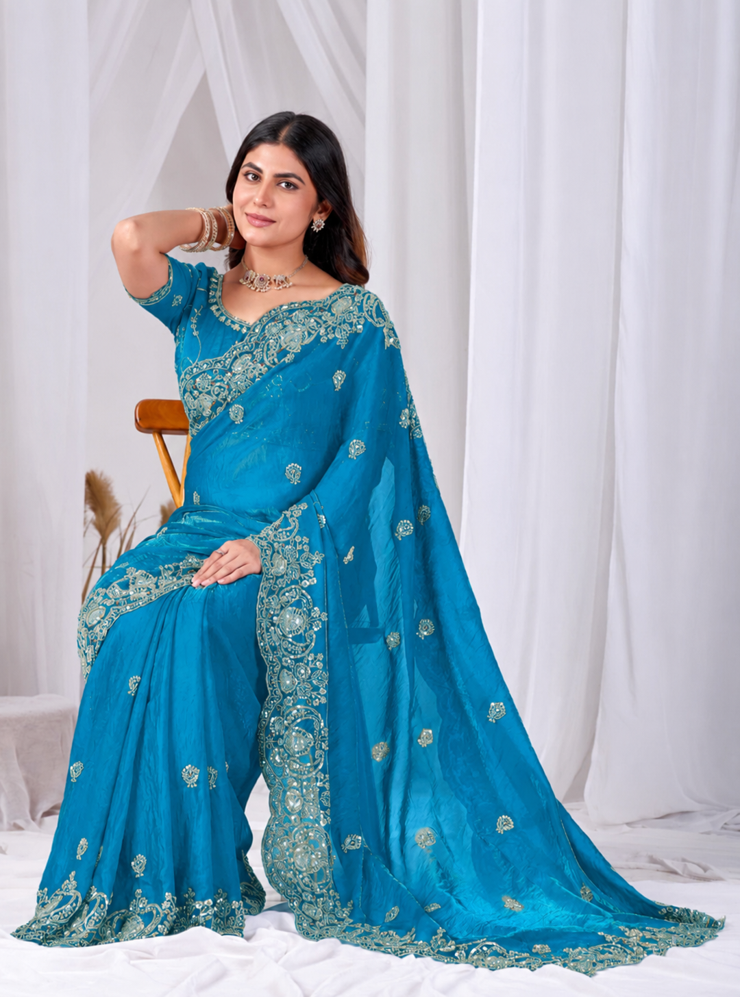 Sky Blue Tikki Moti Work Embroidered Designer Saree Sky Blue Tikki Moti Work Embroidered Designer Saree + The Sky Blue Tikki Moti Work Embroidered Designer Saree brings tikki (metallic sequin) and moti (pearl-bead) hand embroidery to a sky blue base, and it's built for anyone comparing options for a sky sarees rather than something purely decorative. The colour reads true in both daylight and indoor event lighting, which matters more than it sounds &mdash; a lot of sarees photograph differently under venue lighting than they do in a product shot, and this one has been chosen to hold its tone consistently. &bull; Craftsmanship