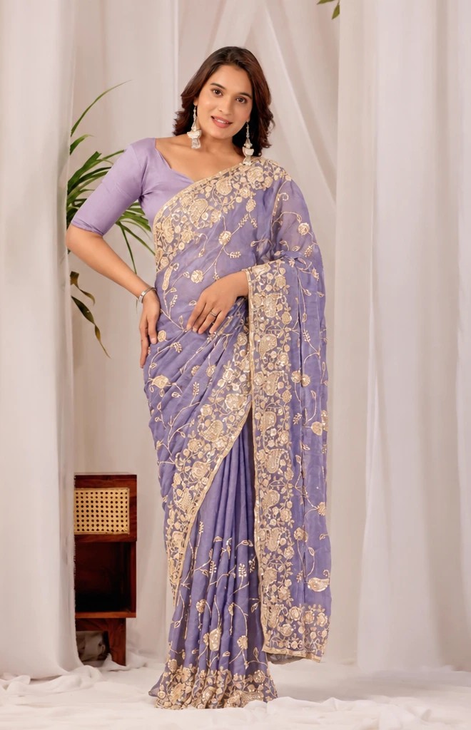 Purple Regal Floral Heritage Saree Purple Regal Floral Heritage Saree + The Purple Regal Floral Heritage Saree brings traditional floral motif weaving to a purple base, and it's built for anyone comparing options for a purple saree rather than something purely decorative. The colour reads true in both daylight and indoor event lighting, which matters more than it sounds &mdash; a lot of sarees photograph differently under venue lighting than they do in a product shot, and this one has been chosen to hold its tone consistently. &bull; Craftsmanship