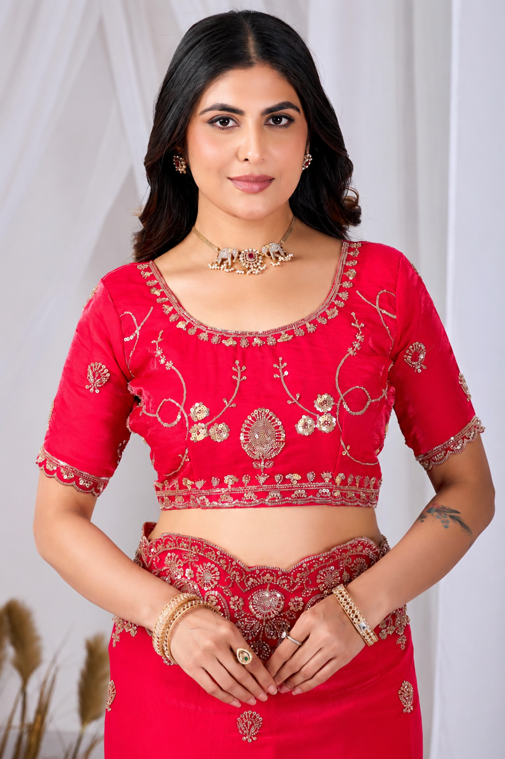 Red Tikki Moti Work Embroidered Designer Saree Red Tikki Moti Work Embroidered Designer Saree + The Red Tikki Moti Work Embroidered Designer Saree brings tikki (metallic sequin) and moti (pearl-bead) hand embroidery to a red base, and it's built for anyone comparing options for a red saree rather than something purely decorative. The colour reads true in both daylight and indoor event lighting, which matters more than it sounds &mdash; a lot of sarees photograph differently under venue lighting than they do in a product shot, and this one has been chosen to hold its tone consistently. &bull; Craftsmanship