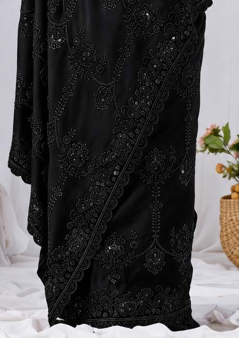 Black Beads work Embroidery Designer Saree Black Beads work Embroidery Designer Saree + The Black Beads Work Embroidery Designer Saree brings hand-applied bead embroidery to a black base, and it's built for anyone comparing options for a black saree rather than something purely decorative. The colour reads true in both daylight and indoor event lighting, which matters more than it sounds &mdash; a lot of sarees photograph differently under venue lighting than they do in a product shot, and this one has been chosen to hold its tone consistently. &bull; Craftsmanship