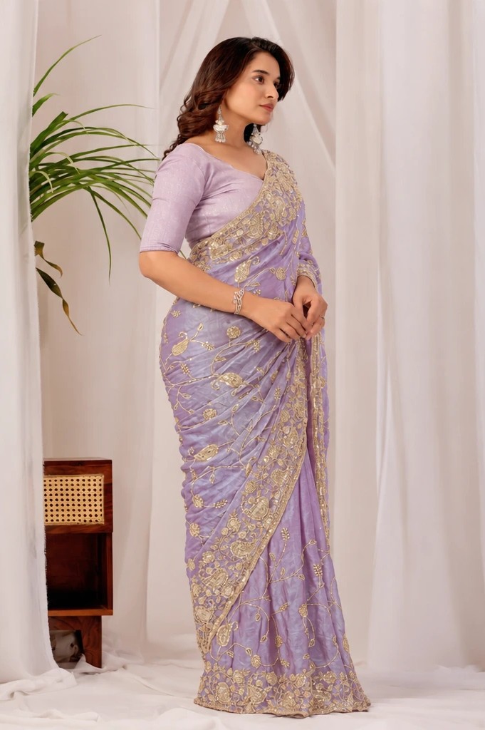 Purple Regal Floral Heritage Saree Purple Regal Floral Heritage Saree + The Purple Regal Floral Heritage Saree brings traditional floral motif weaving to a purple base, and it's built for anyone comparing options for a purple saree rather than something purely decorative. The colour reads true in both daylight and indoor event lighting, which matters more than it sounds &mdash; a lot of sarees photograph differently under venue lighting than they do in a product shot, and this one has been chosen to hold its tone consistently. &bull; Craftsmanship