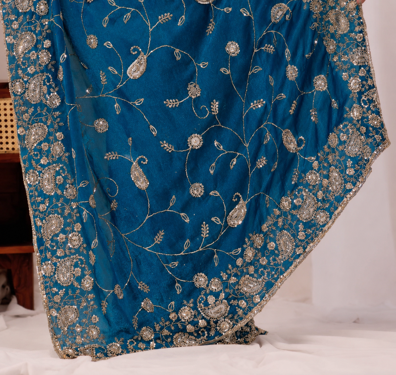Blue Regal Floral Heritage Saree Blue Regal Floral Heritage Saree + The Blue Regal Floral Heritage Saree brings traditional floral motif weaving to a blue base, and it's built for anyone comparing options for a blue saree rather than something purely decorative. The colour reads true in both daylight and indoor event lighting, which matters more than it sounds &mdash; a lot of sarees photograph differently under venue lighting than they do in a product shot, and this one has been chosen to hold its tone consistently. &bull; Craftsmanship