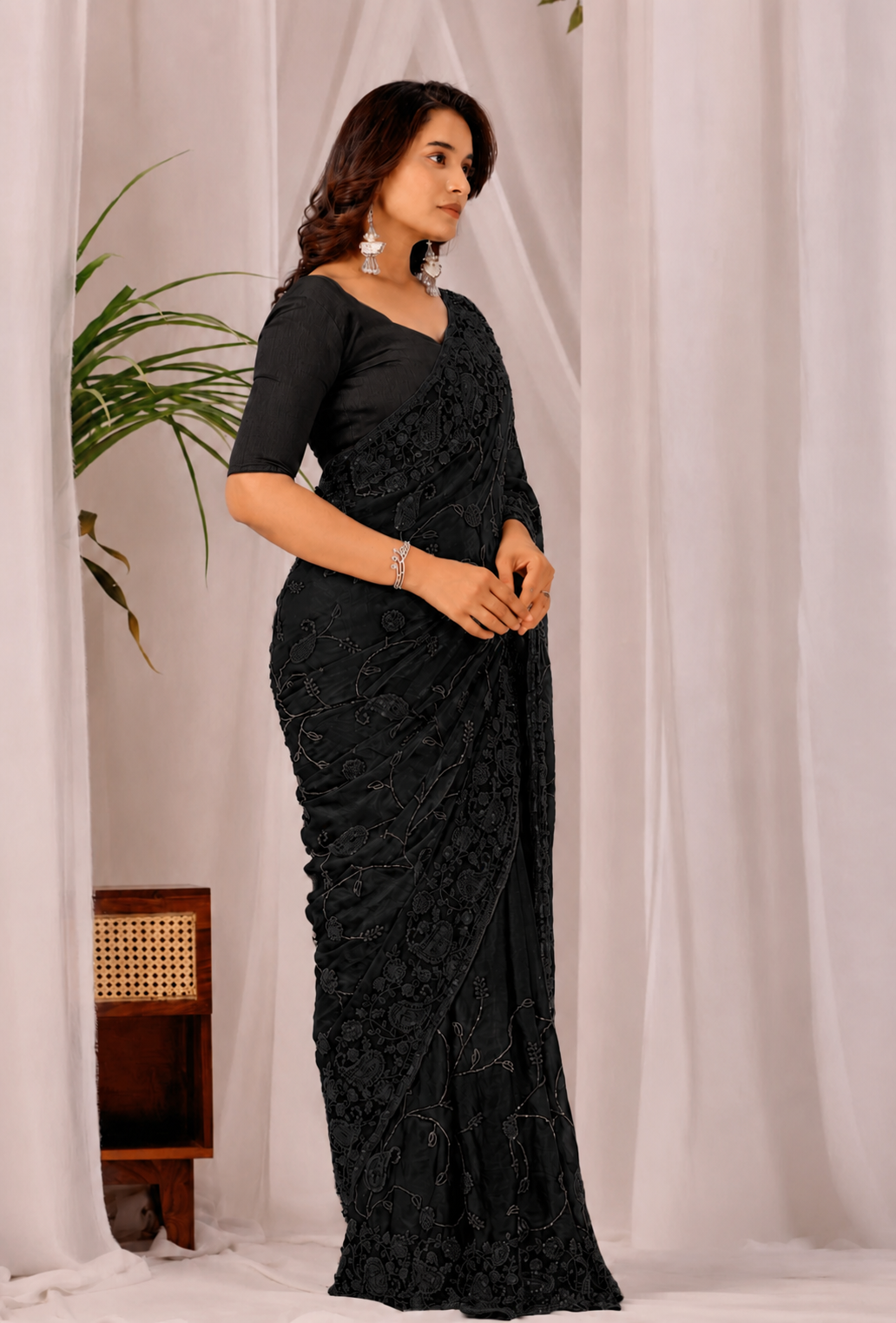 Black Regal Floral Heritage Saree Black Regal Floral Heritage Saree + The Black Regal Floral Heritage Saree brings traditional floral motif weaving to a black base, and it's built for anyone comparing options for a black saree rather than something purely decorative. The colour reads true in both daylight and indoor event lighting, which matters more than it sounds &mdash; a lot of sarees photograph differently under venue lighting than they do in a product shot, and this one has been chosen to hold its tone consistently. &bull; Craftsmanship