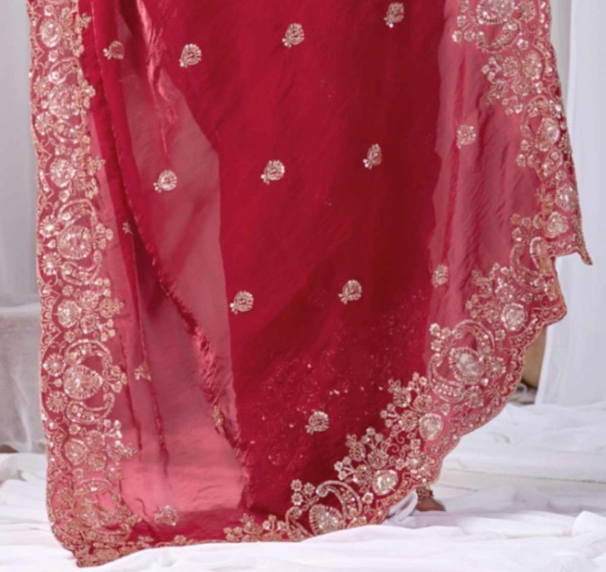 Rose Red Tikki Moti Work Embroidered Designer Saree Rose Red Tikki Moti Work Embroidered Designer Saree + The Rose Red Tikki Moti Work Embroidered Designer Saree brings tikki (metallic sequin) and moti (pearl-bead) hand embroidery to a rose red base, and it's built for anyone comparing options for a saree rose rather than something purely decorative. The colour reads true in both daylight and indoor event lighting, which matters more than it sounds &mdash; a lot of sarees photograph differently under venue lighting than they do in a product shot, and this one has been chosen to hold its tone consistently. &bull; Craftsmanship
