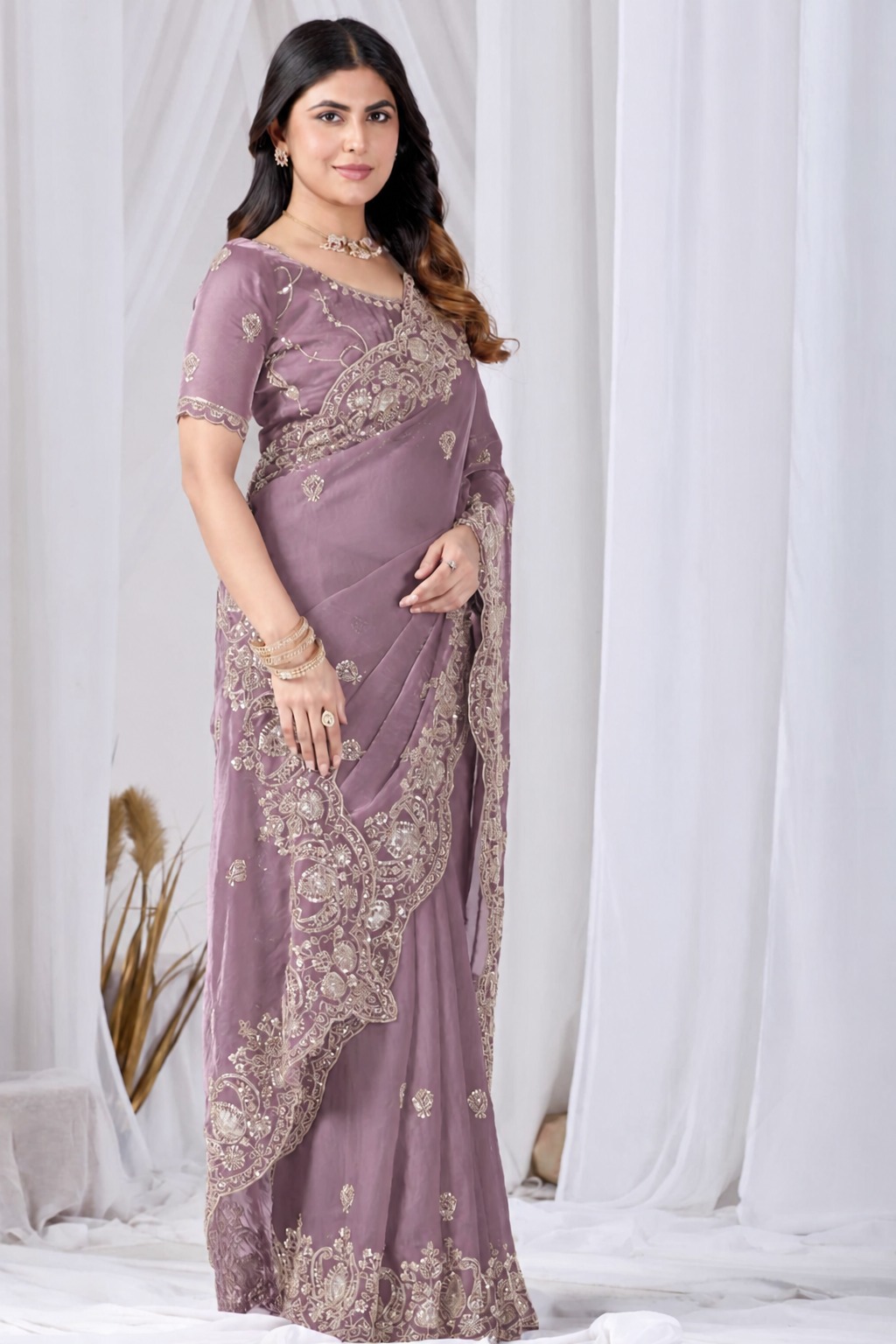 Pink Tikki Moti Work Embroidered Designer Saree Pink Tikki Moti Work Embroidered Designer Saree + The Pink Tikki Moti Work Embroidered Designer Saree brings tikki (metallic sequin) and moti (pearl-bead) hand embroidery to a pink base, and it's built for anyone comparing options for a pink saree rather than something purely decorative. The colour reads true in both daylight and indoor event lighting, which matters more than it sounds &mdash; a lot of sarees photograph differently under venue lighting than they do in a product shot, and this one has been chosen to hold its tone consistently. &bull; Craftsmanship