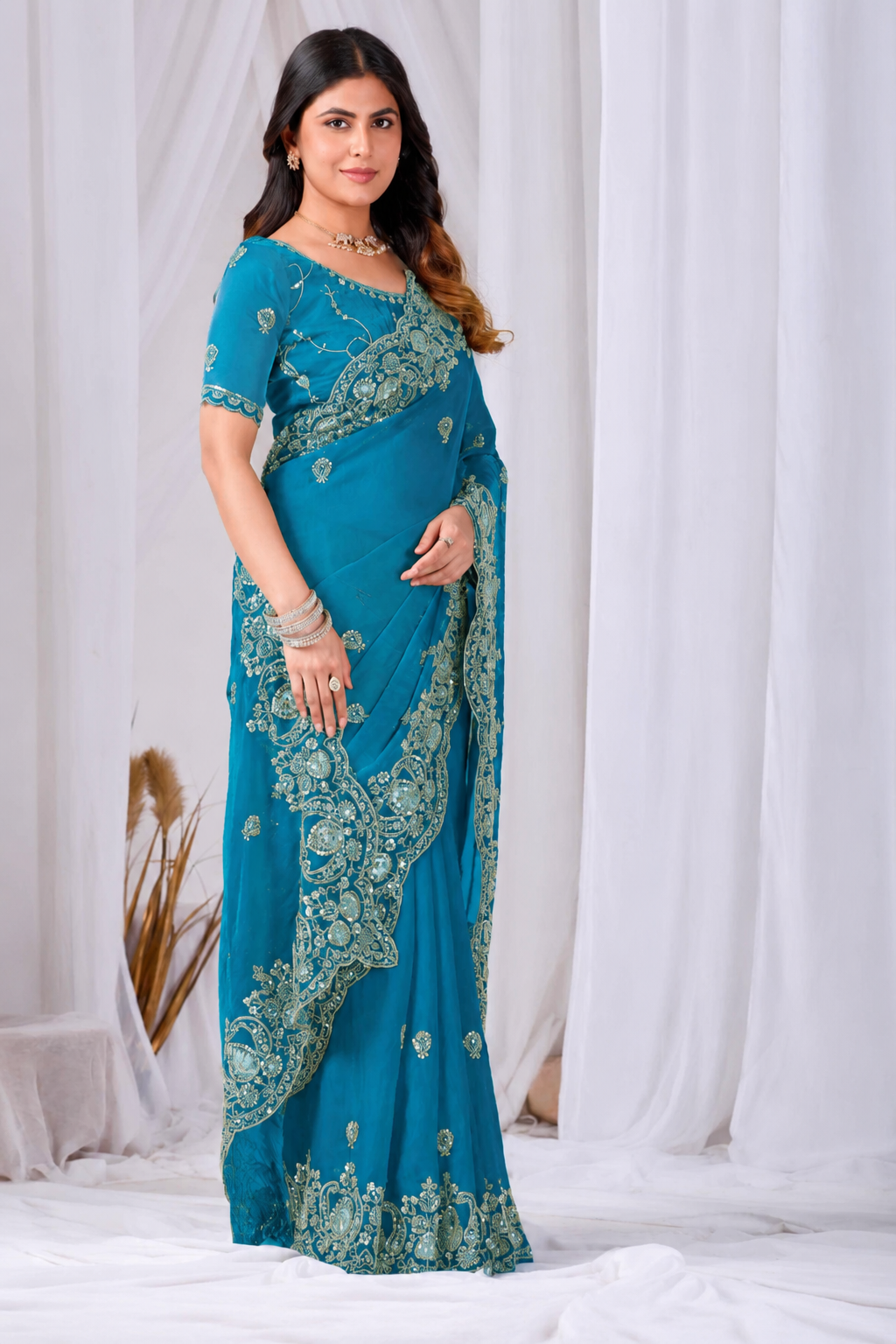 Sky Blue Tikki Moti Work Embroidered Designer Saree Sky Blue Tikki Moti Work Embroidered Designer Saree + The Sky Blue Tikki Moti Work Embroidered Designer Saree brings tikki (metallic sequin) and moti (pearl-bead) hand embroidery to a sky blue base, and it's built for anyone comparing options for a sky sarees rather than something purely decorative. The colour reads true in both daylight and indoor event lighting, which matters more than it sounds &mdash; a lot of sarees photograph differently under venue lighting than they do in a product shot, and this one has been chosen to hold its tone consistently. &bull; Craftsmanship