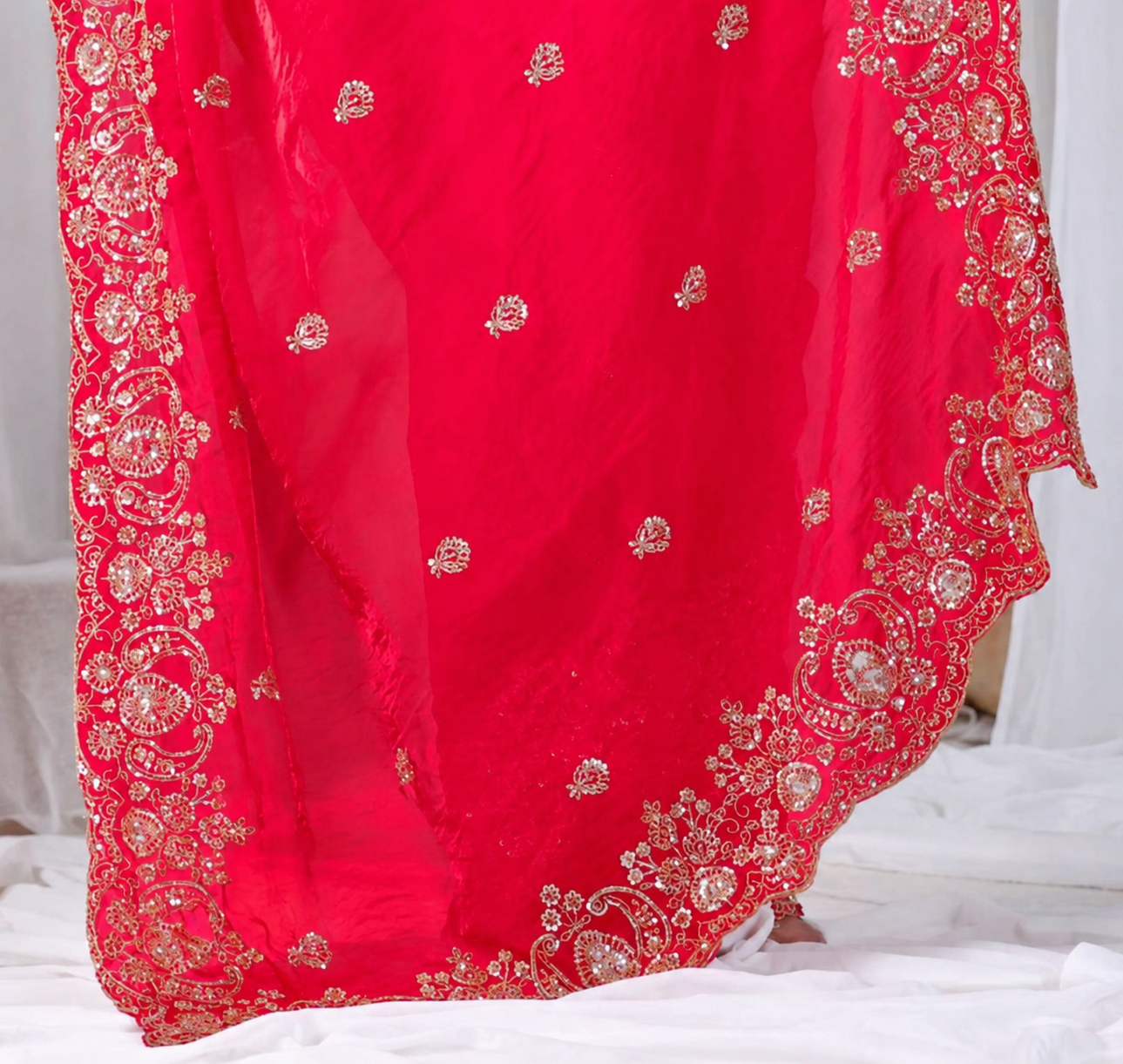 Red Tikki Moti Work Embroidered Designer Saree Red Tikki Moti Work Embroidered Designer Saree + The Red Tikki Moti Work Embroidered Designer Saree brings tikki (metallic sequin) and moti (pearl-bead) hand embroidery to a red base, and it's built for anyone comparing options for a red saree rather than something purely decorative. The colour reads true in both daylight and indoor event lighting, which matters more than it sounds &mdash; a lot of sarees photograph differently under venue lighting than they do in a product shot, and this one has been chosen to hold its tone consistently. &bull; Craftsmanship